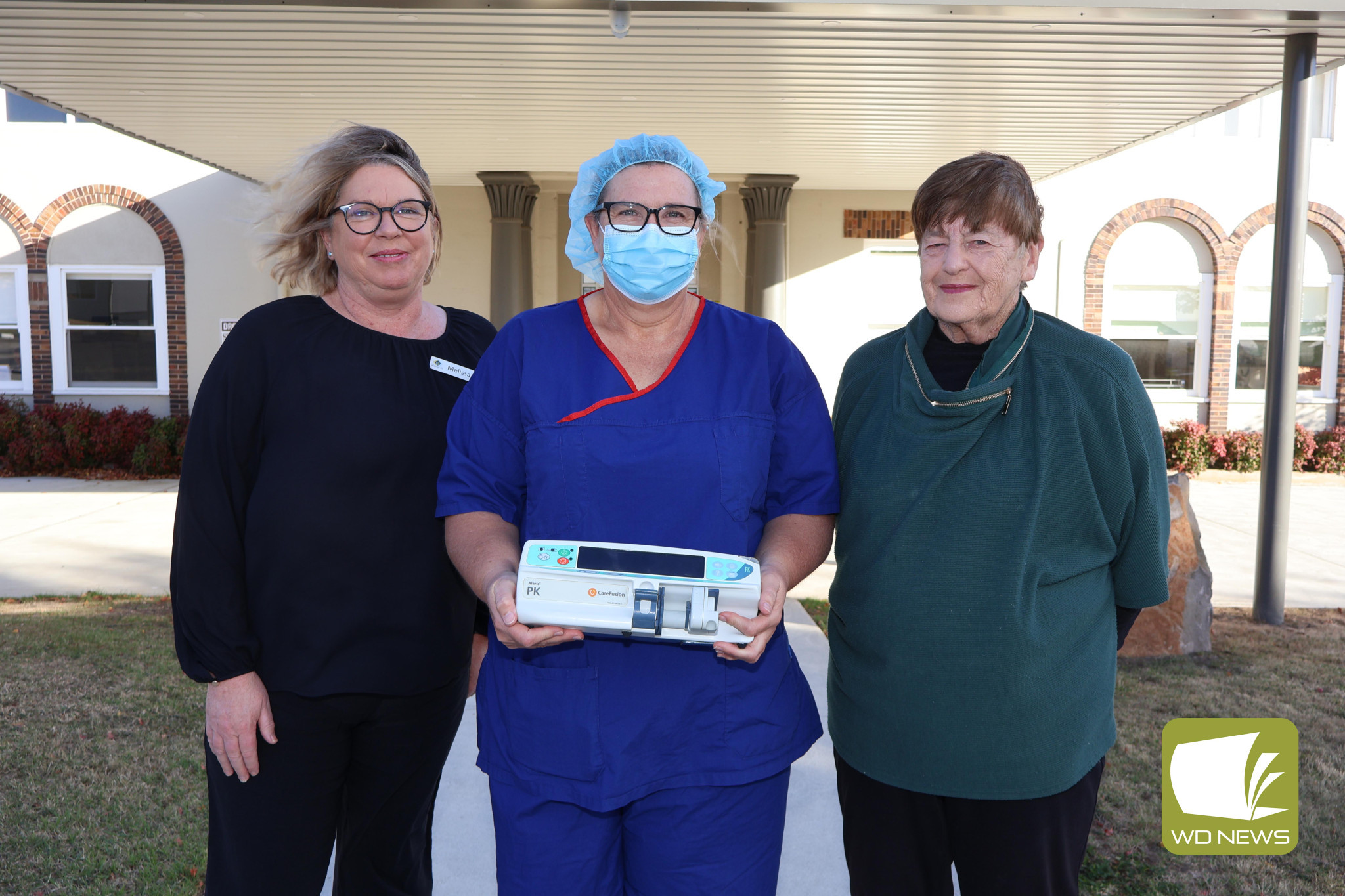 Donation: Terang Mortlake Health Service’s Melissa Mitchell (from left) and Lynda McKenzie welcomed Terang Ladies Auxiliary secretary Susan Keane to discuss the addition of a new piece of theatre equipment.