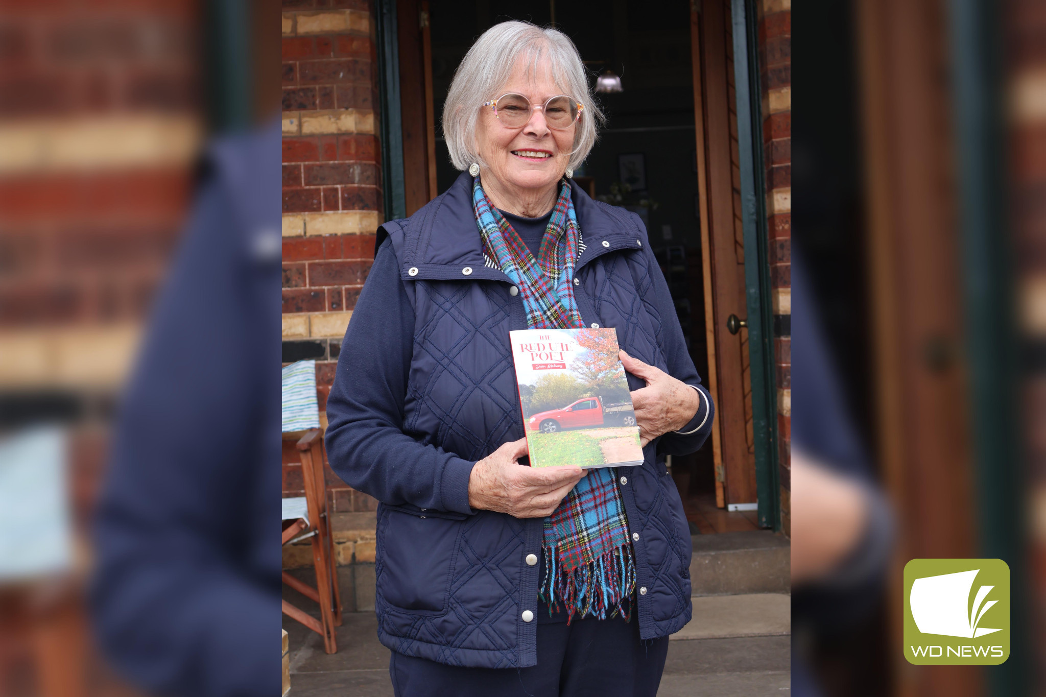 Inspiring red ute: Poet Joan Mahony has released a new poem book this week, many of which have been written while sitting in her red ute.