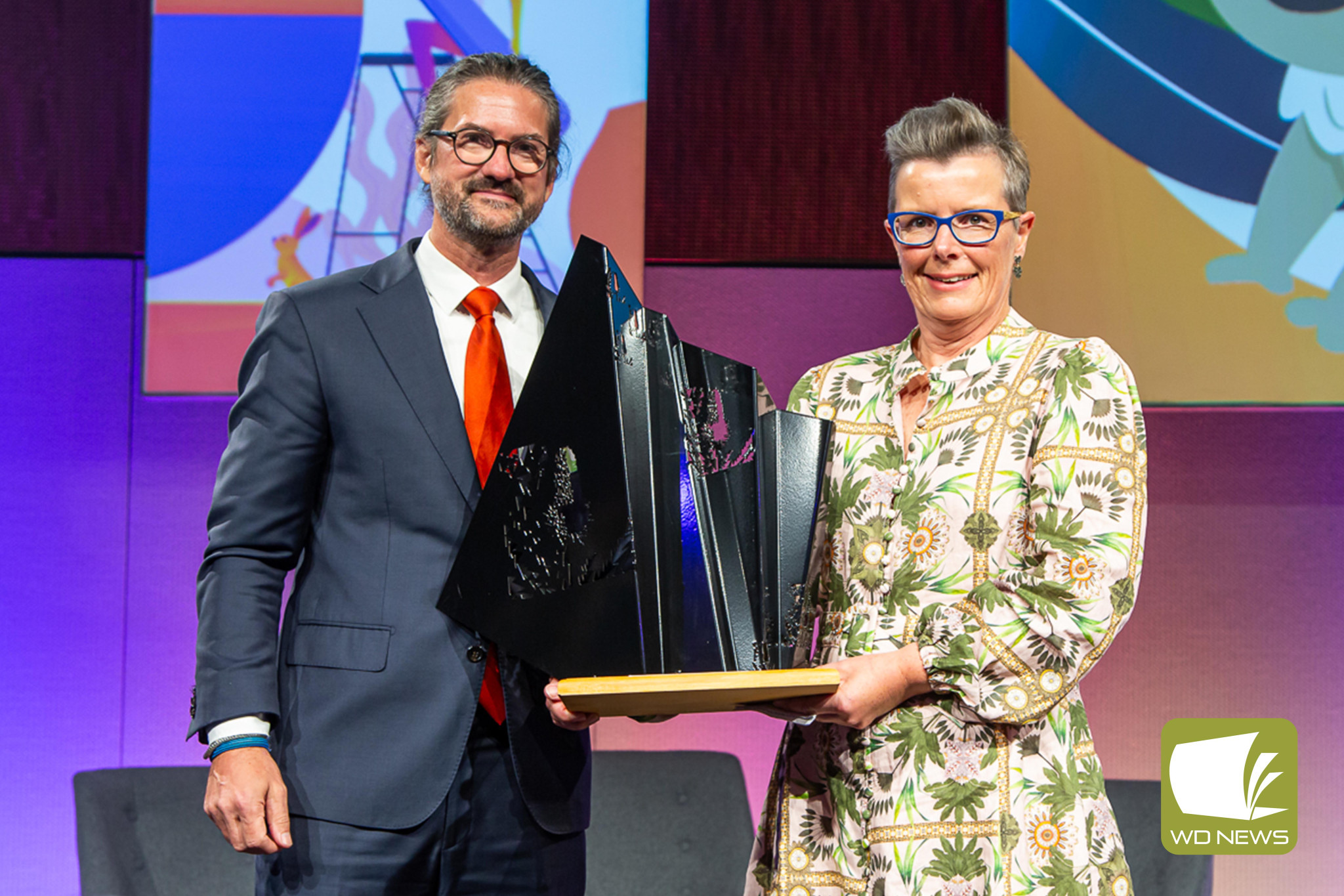 Congratulations: Vic Catchments executive officer Tony Baker and Vic Catchments chair Cath Jenkins accepting the Nature Positive Award at the 35th National Banksia Sustainability Awards.