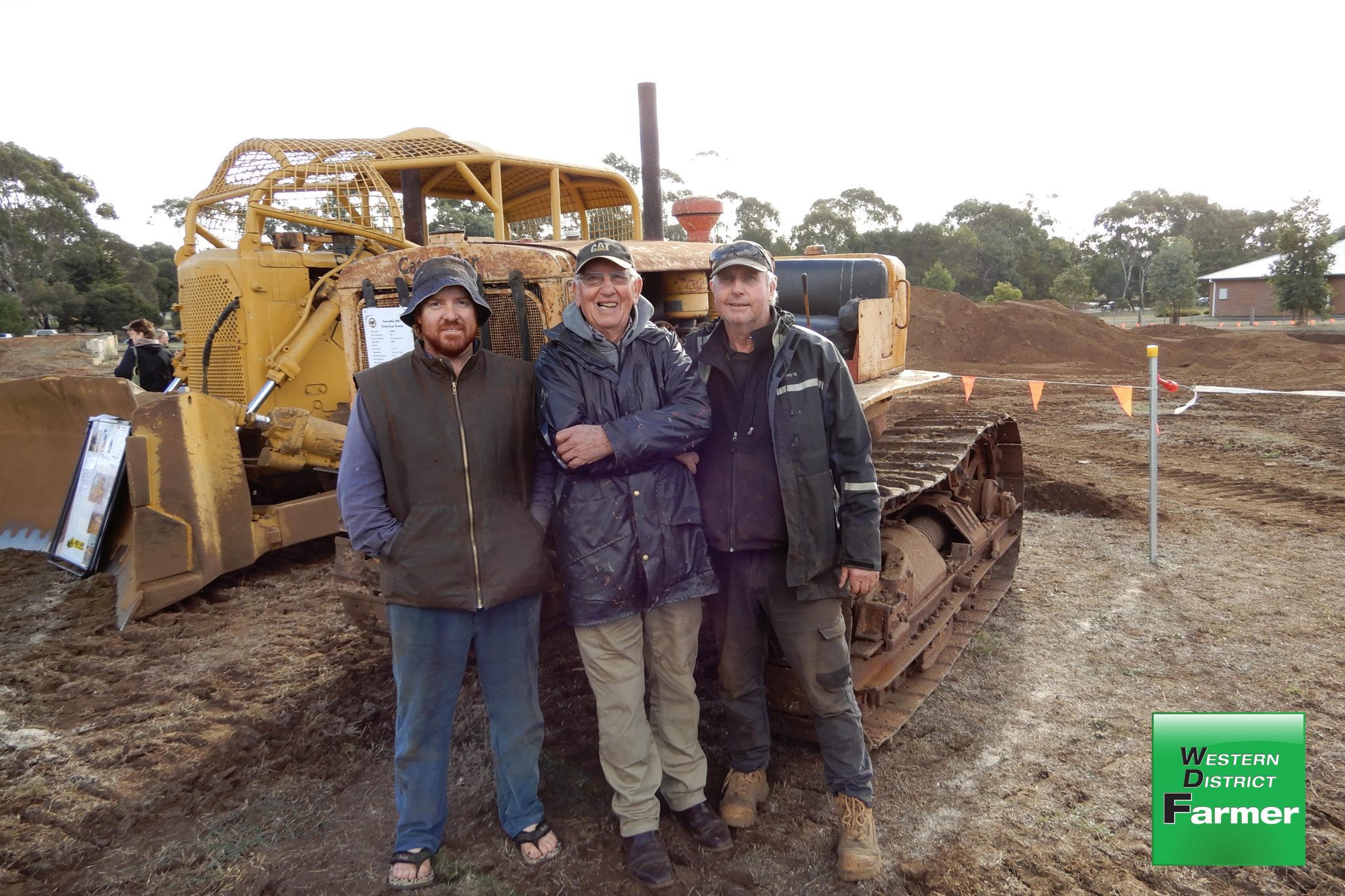 Ollie Guyette (Ballangeigh), Lawrence Hose (Naringal) and Gary Atwell (Laang) with Lawrence’s Caterpillar RD7.