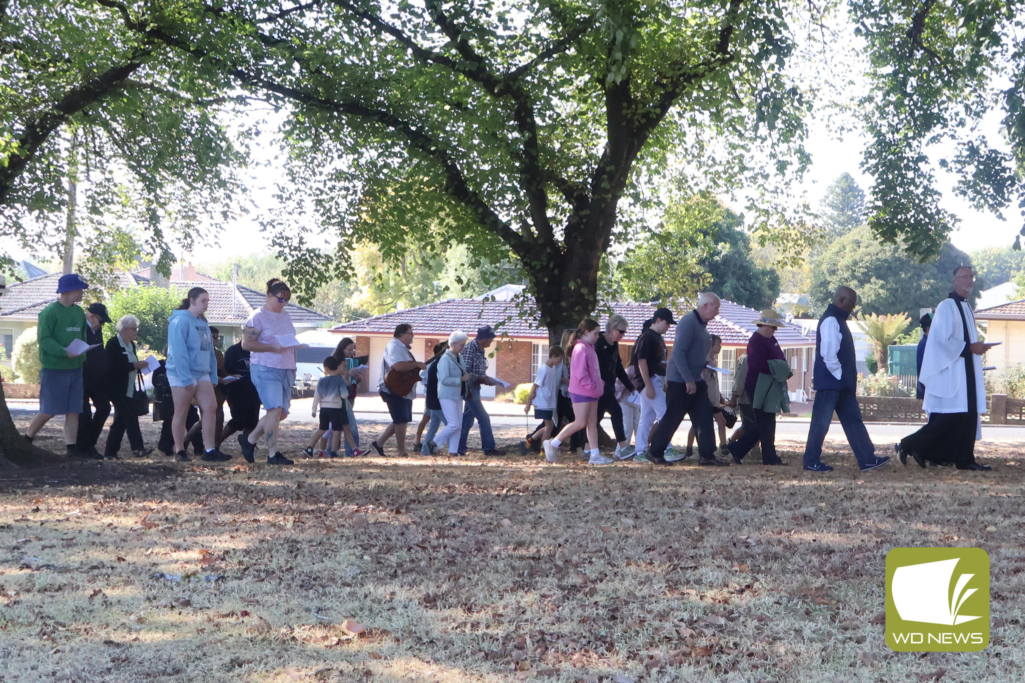 Walk of witness: Prayers and hymns filled the streets of Camperdown as the Uniting Church, St Paul’s Anglican Church and St Patrick’s Church came together to mark Good Friday.