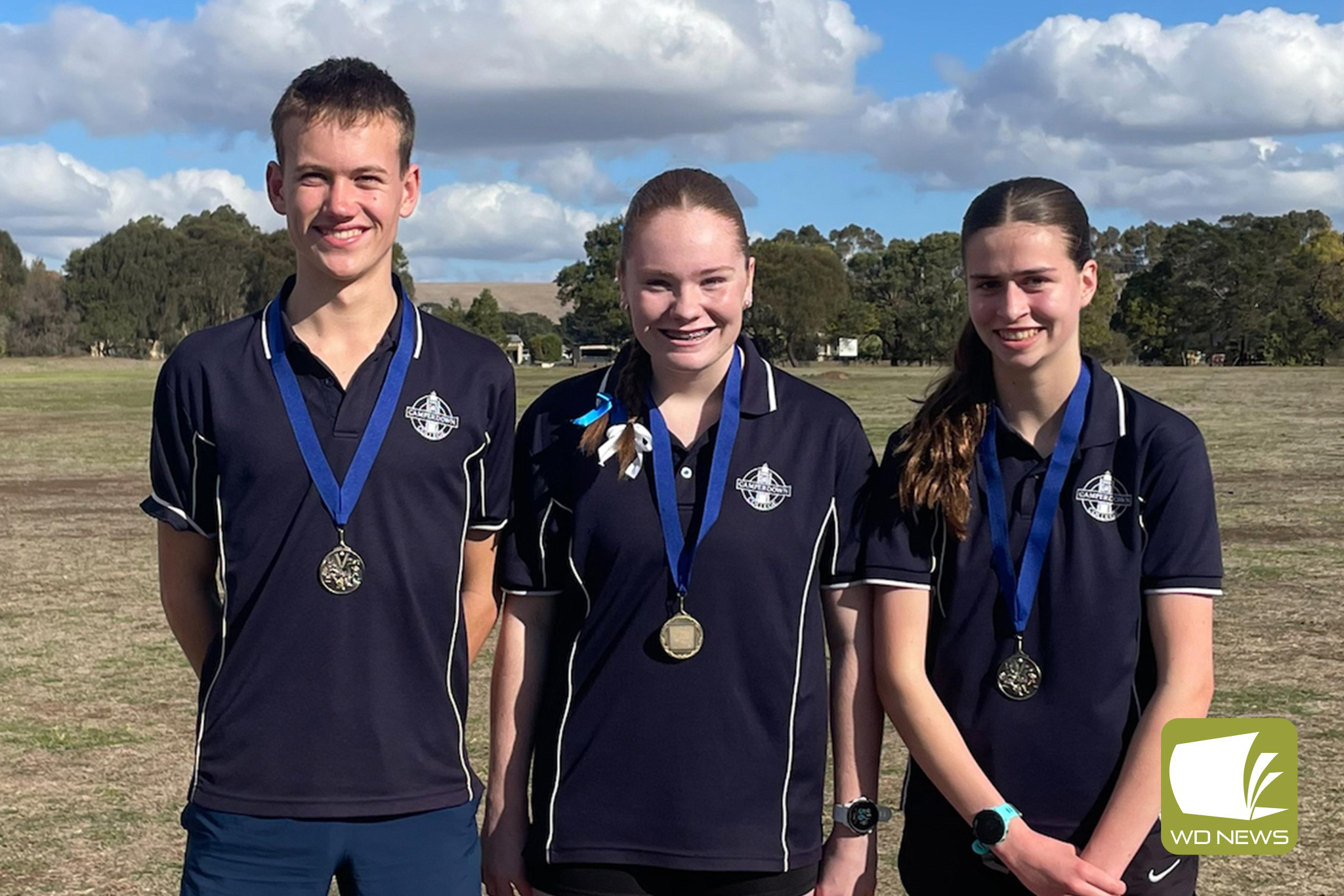 Quinn, Pippa and Georgie came home with age group champion medallions.