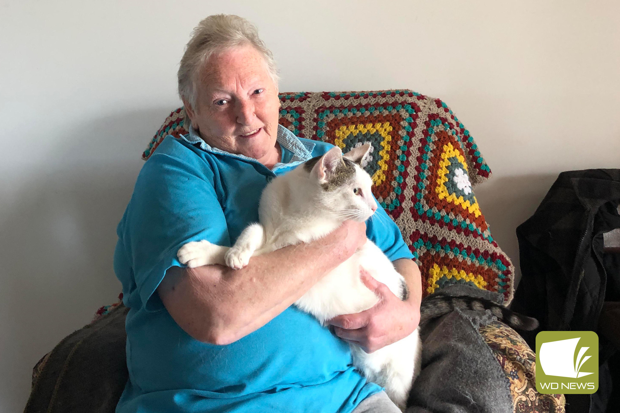 South Purrumbete’s Shirley Rethus, pictured with Snowpo, encourages Corangamite Shire residents to make the most of the cat desexing program.