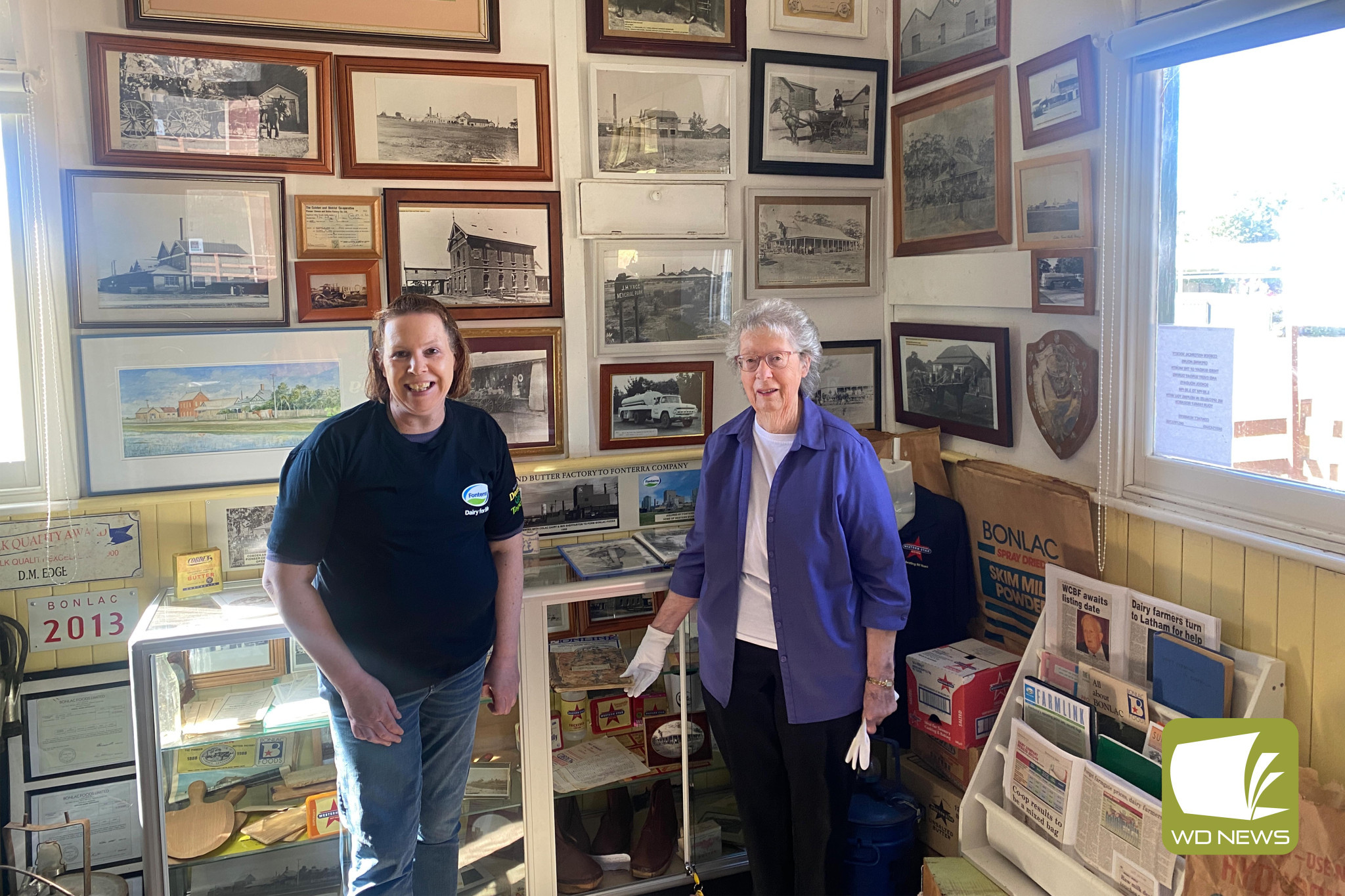 Making a difference: Fonterra Cobden’s Lynda Whitehead and Cobden and District Historical Society member Jennifer Kripp admire a piece of local history.