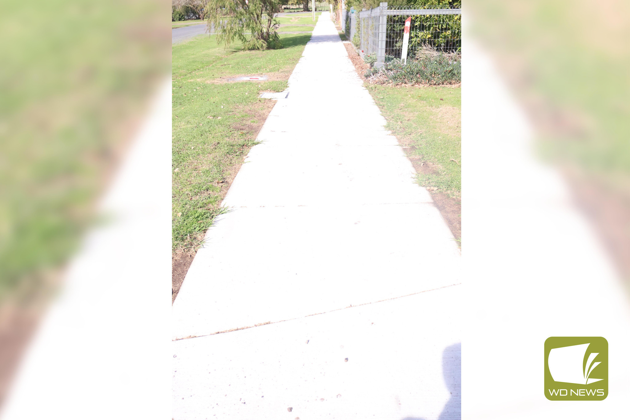 Under budget: Councillors praised the Corangamite Shire works team for delivering another footpath under budget.