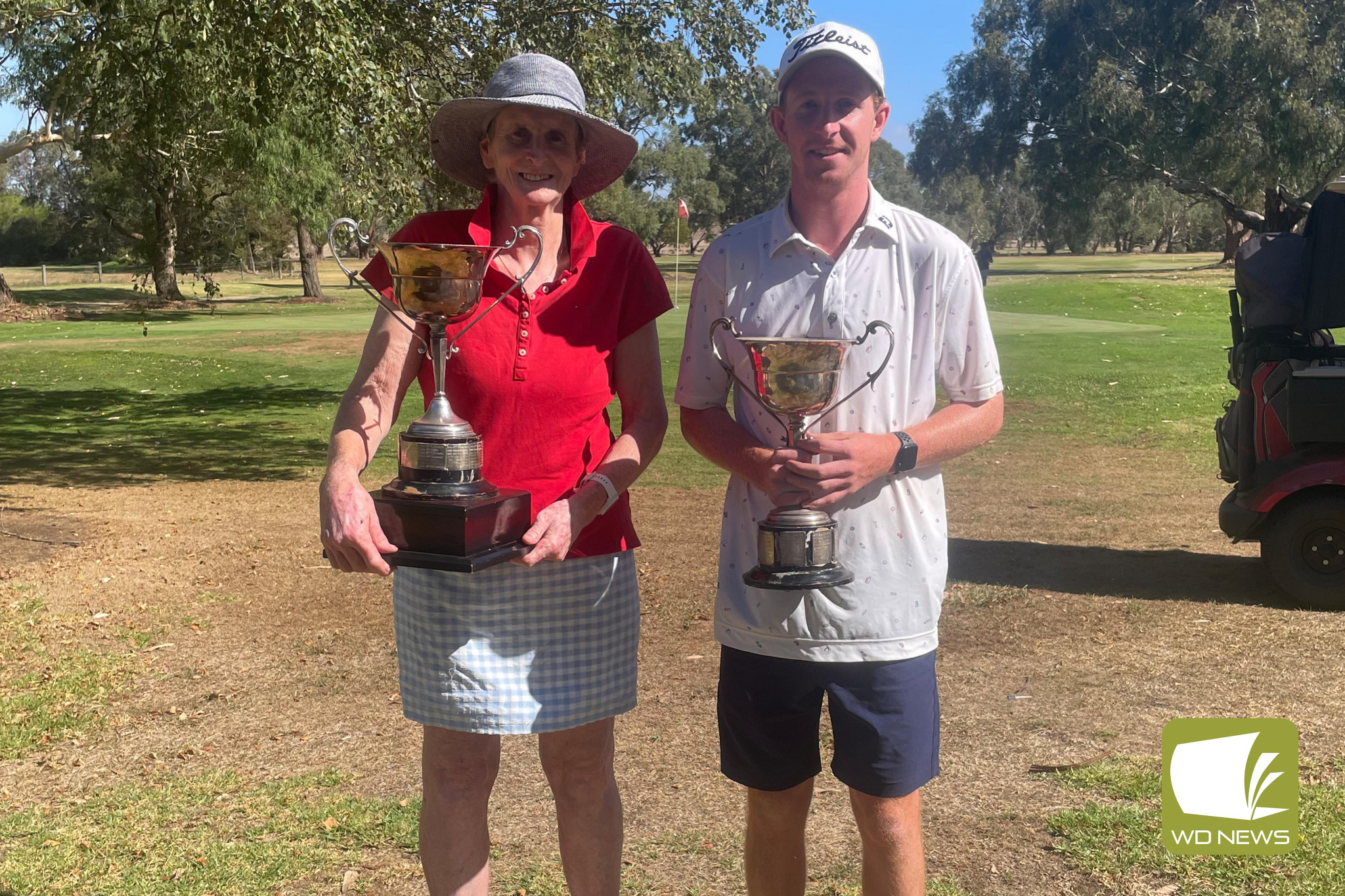 Overall club champions Marion Venn and Fred Beasley.