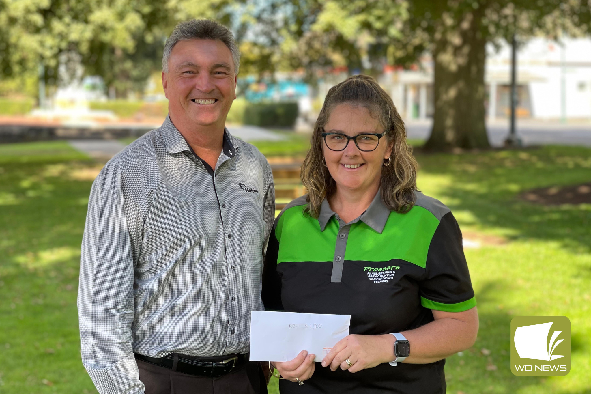 Kind generosity: Tom Moran was thrilled to hand over a $1900 donation on behalf of the Camperdown Golf Club to Kellie Kempton, Camperdown’s Good Friday Appeal coordinator.