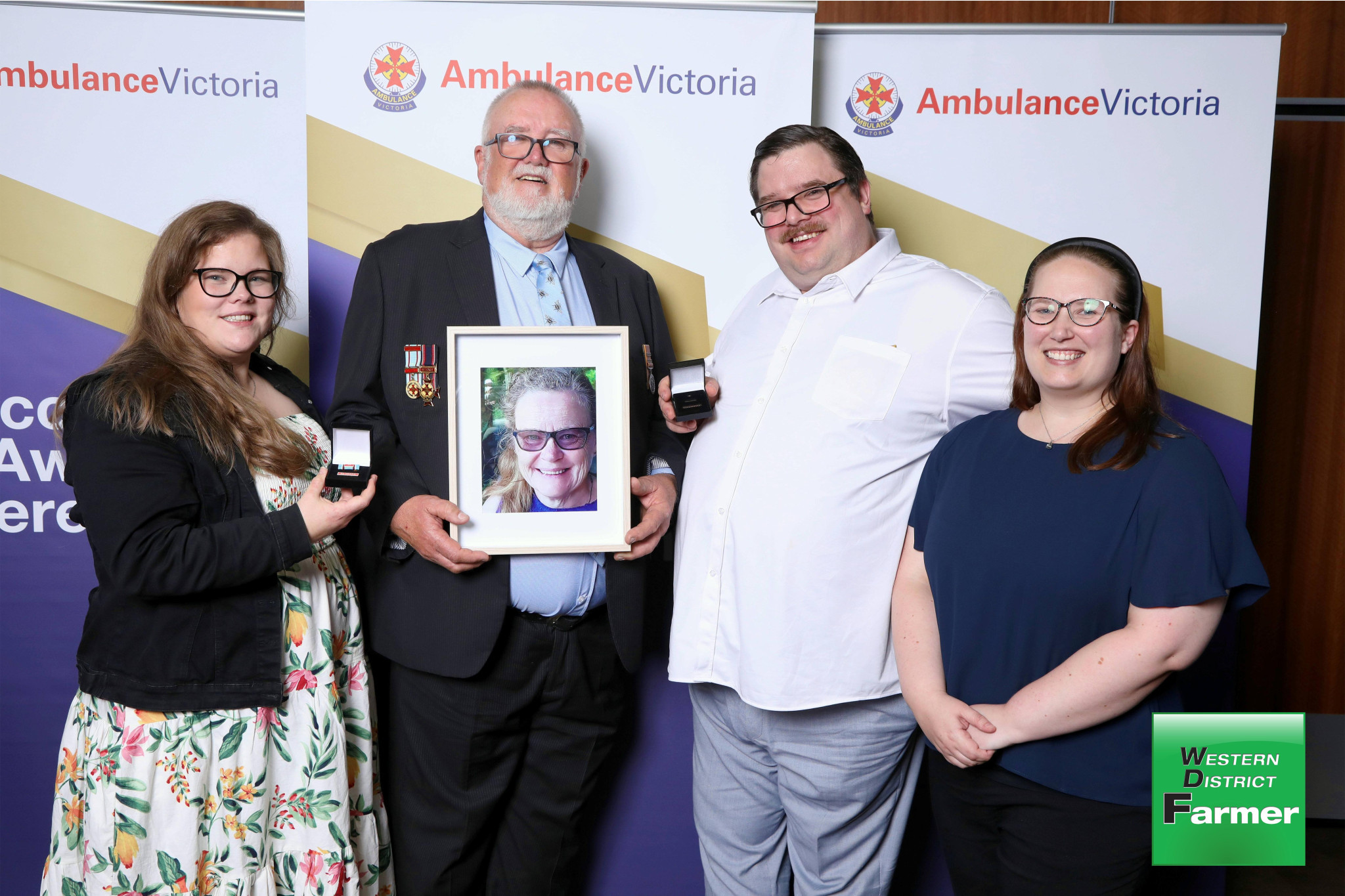 Malcolm Hunting (centre) and his family (from left) Bethany, Phillip and Kirsten.