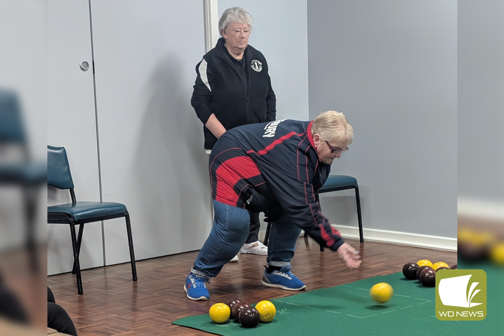 In Division 1, Camperdown 1 Lead Judy Borthwick delivers her bowl as Camperdown 2 Lead Margaret Ovens watches.