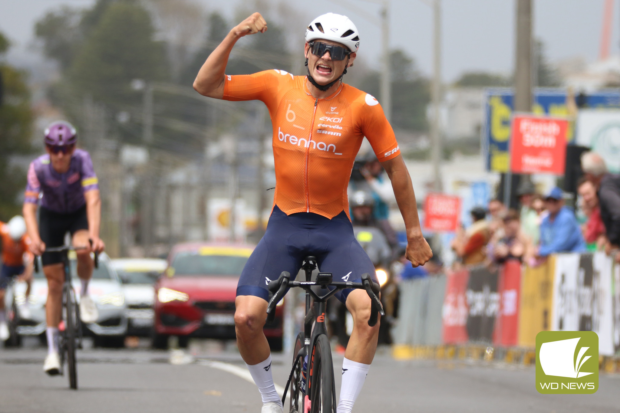 Winner of the Melbourne to Warrnambool Blake Agnoletto celebrates victory.