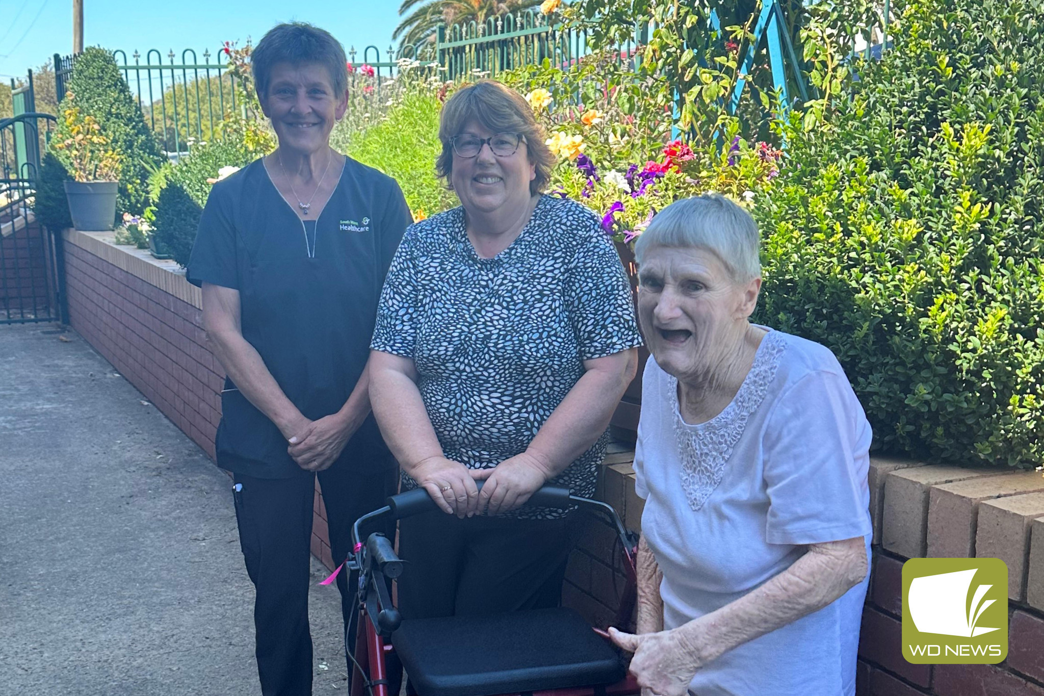 Proud of their work: IPC lead role Merindah Lodge Susan Brown and quality coordinator Sally Mactaggart (pictured with Merindah Lodge resident Josie Douglas) were proud of the audit results for Merindah Lodge.