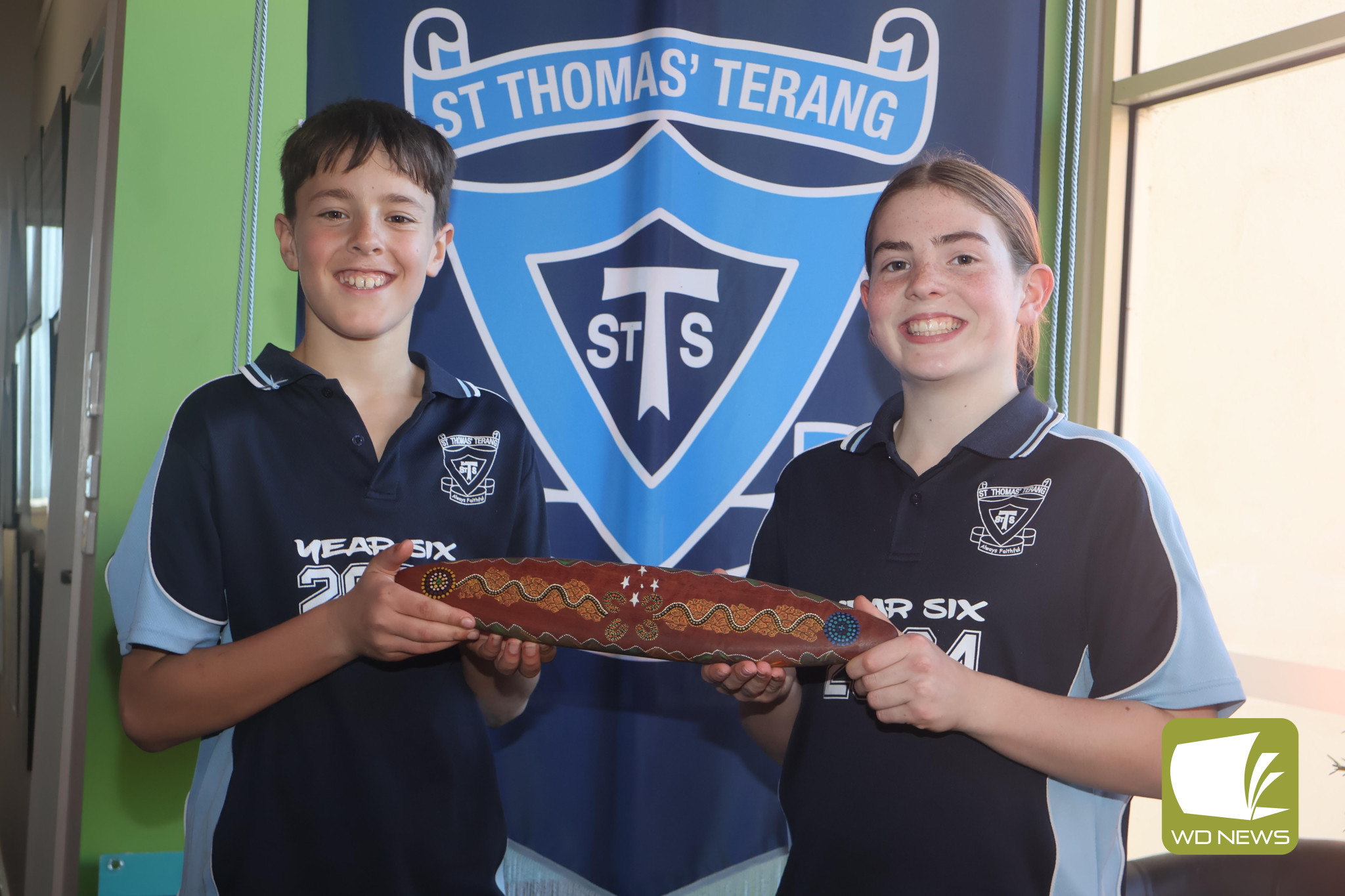 A special message: St Thomas’ Primary School captains Harper Dillon and Jade Byron were among the students to welcome the opportunity to serve as custodians of a special message stick, created to celebrate the 150th milestone for the Catholic Diocese of Ballarat.