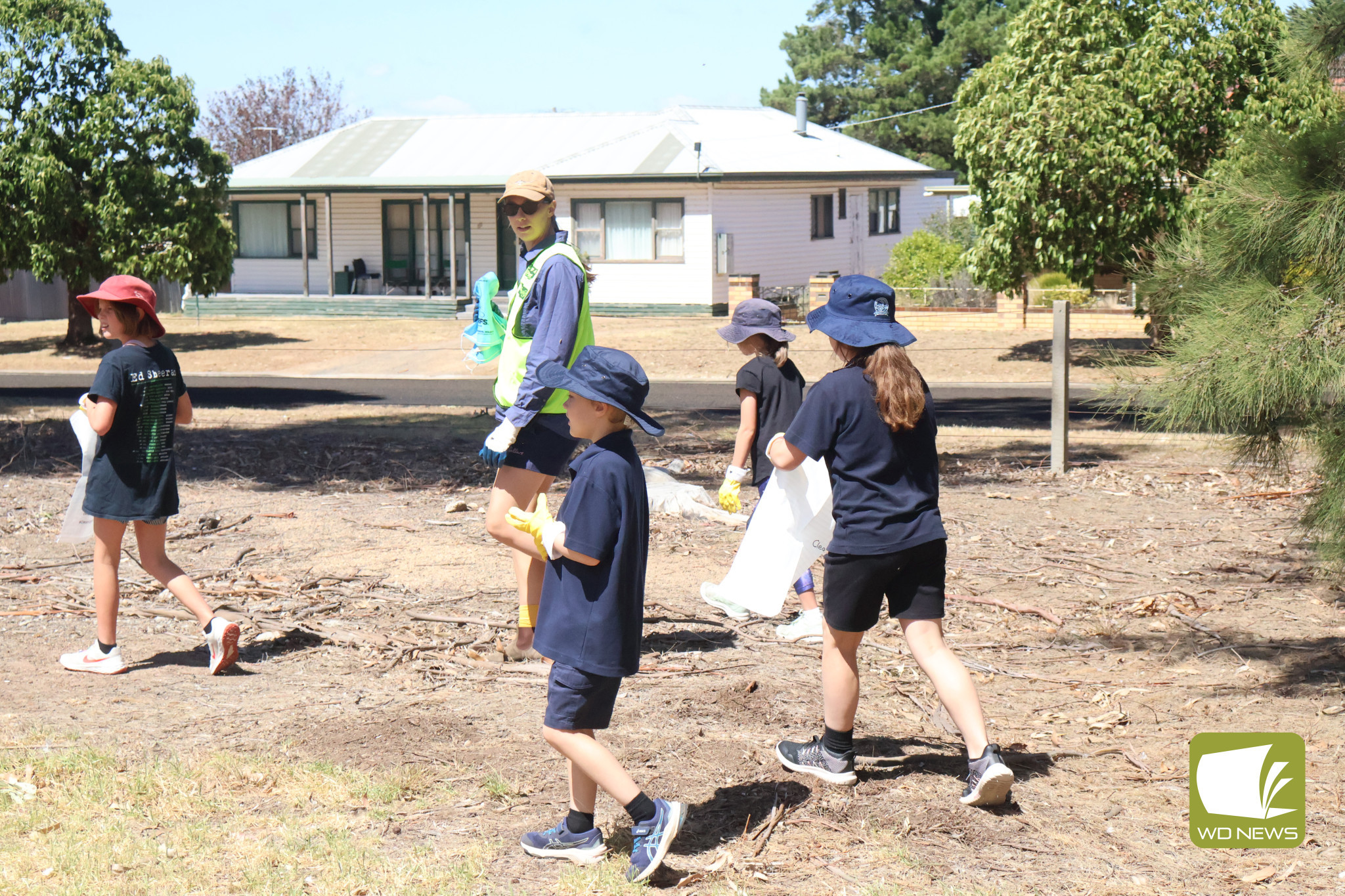 For the environment: Students at Lismore Primary School tidied their school grounds as part of Clean Up Australia Day.