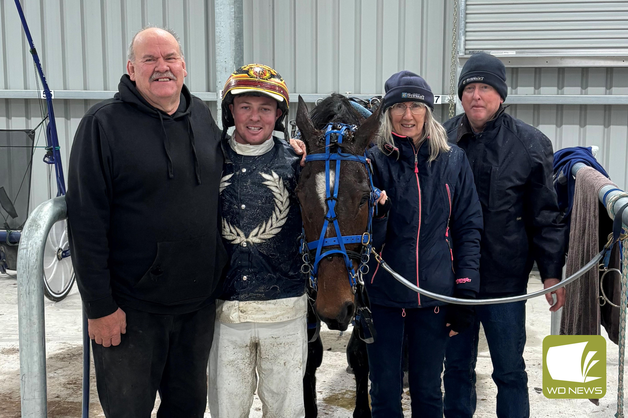 Race 7 Bakers Bandit with driver Jason Lee, trainer Steve Lambert and winning connections.