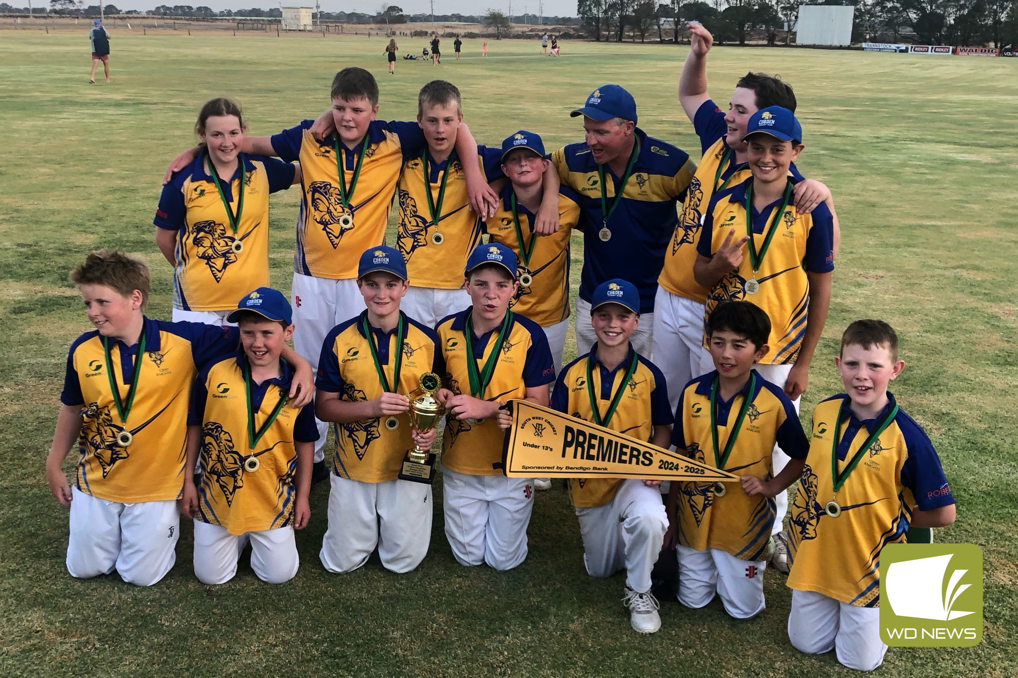 Cobden’s Under 13 premiers celebrate.