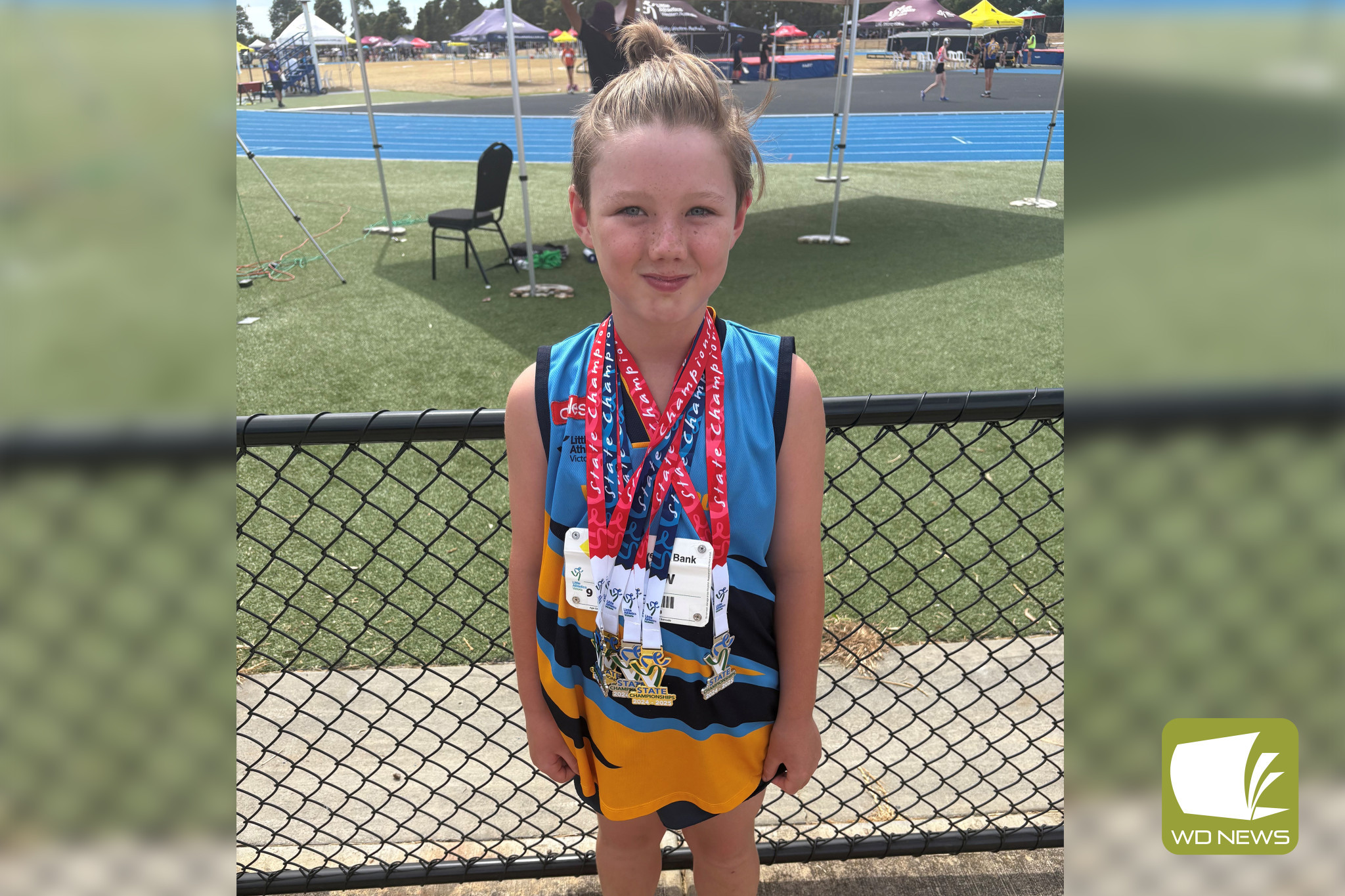 George Wilkinson with his swag of medals won at last weekend’s state championships.