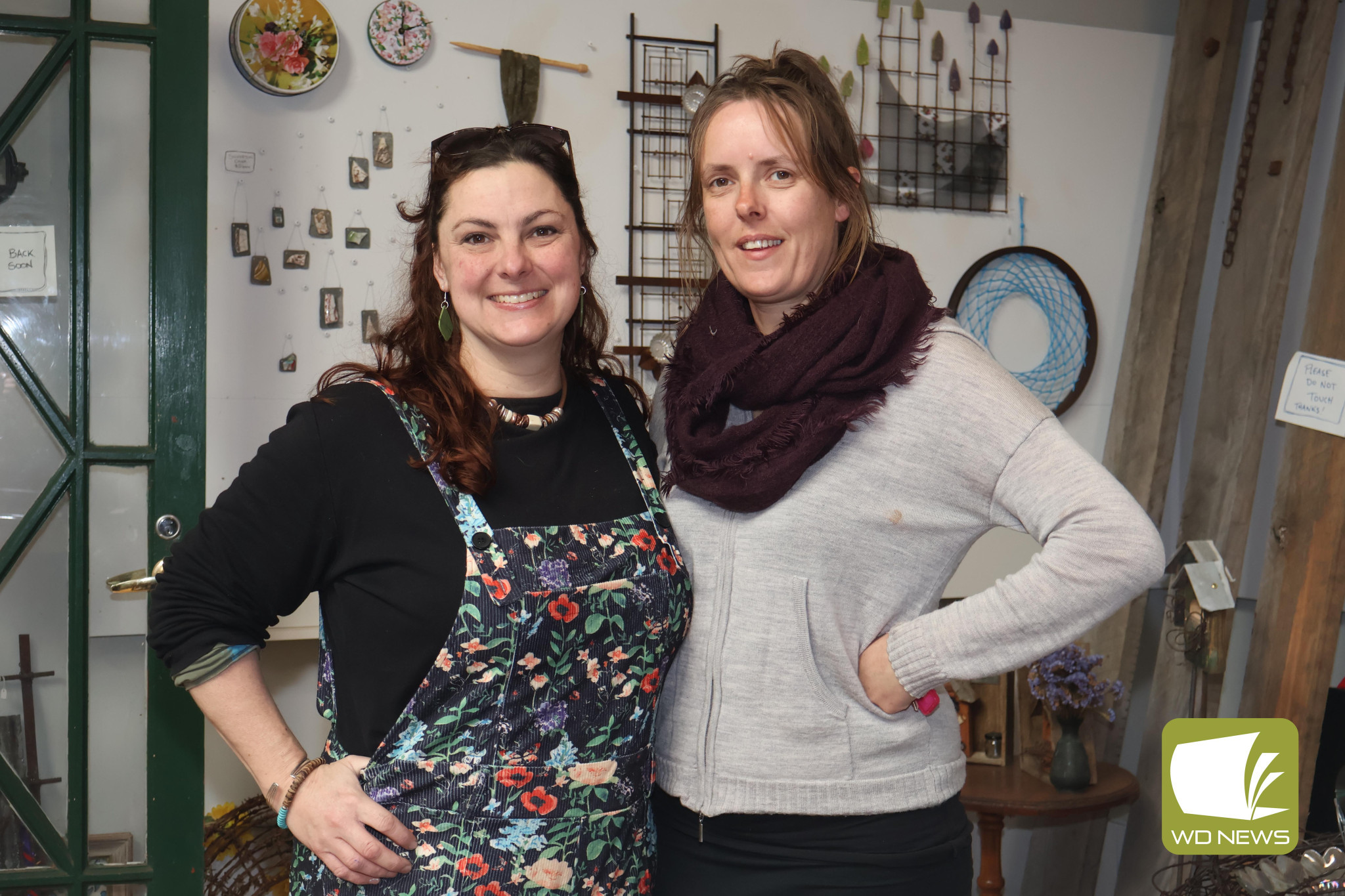 Passing the torch: Glenormiston artist Jess Fowler (left) has signed a lease to open her own art gallery in Terang, using the storefront where her close friend and Rusty Spanner Studio owner Chelsea Pope has spent the past three years.