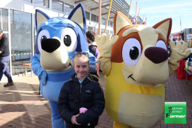 Lily Bentley (8) was happy to meet Bluey and Bingo as they wandered the showgrounds.