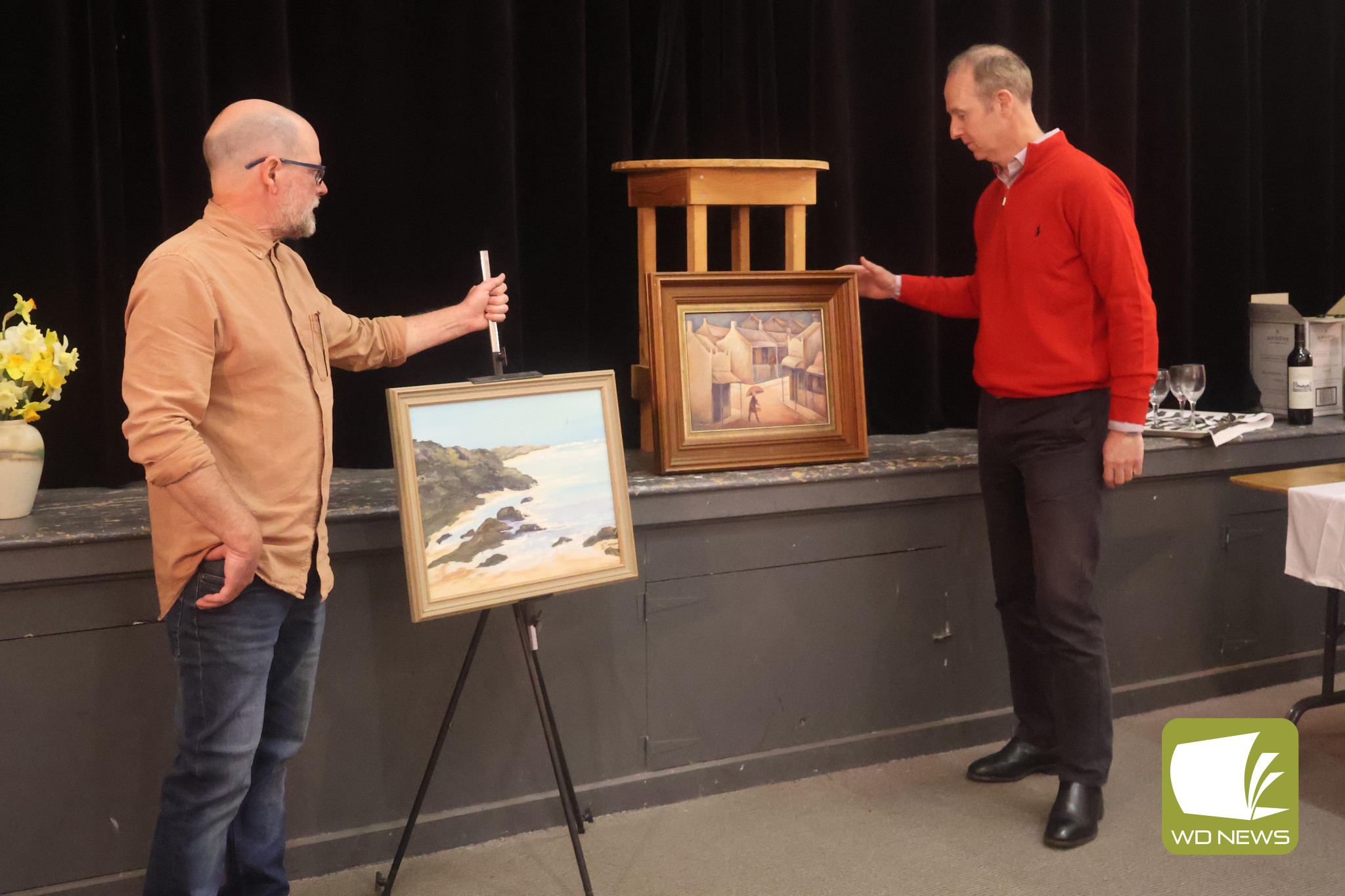 Further generosity: Camperdown Hospital Auxiliary member Mark Leddy (right) presented South West Healthcare Camperdown Residential Aged Care appeal manager Suzan Morey with a cheque at the art show opening on Friday.