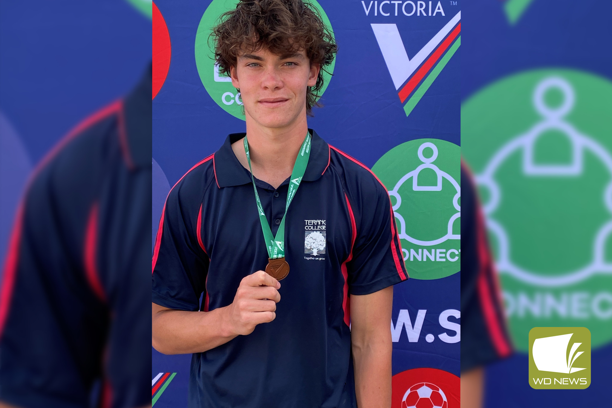 Edward Delaney with his bronze medal.