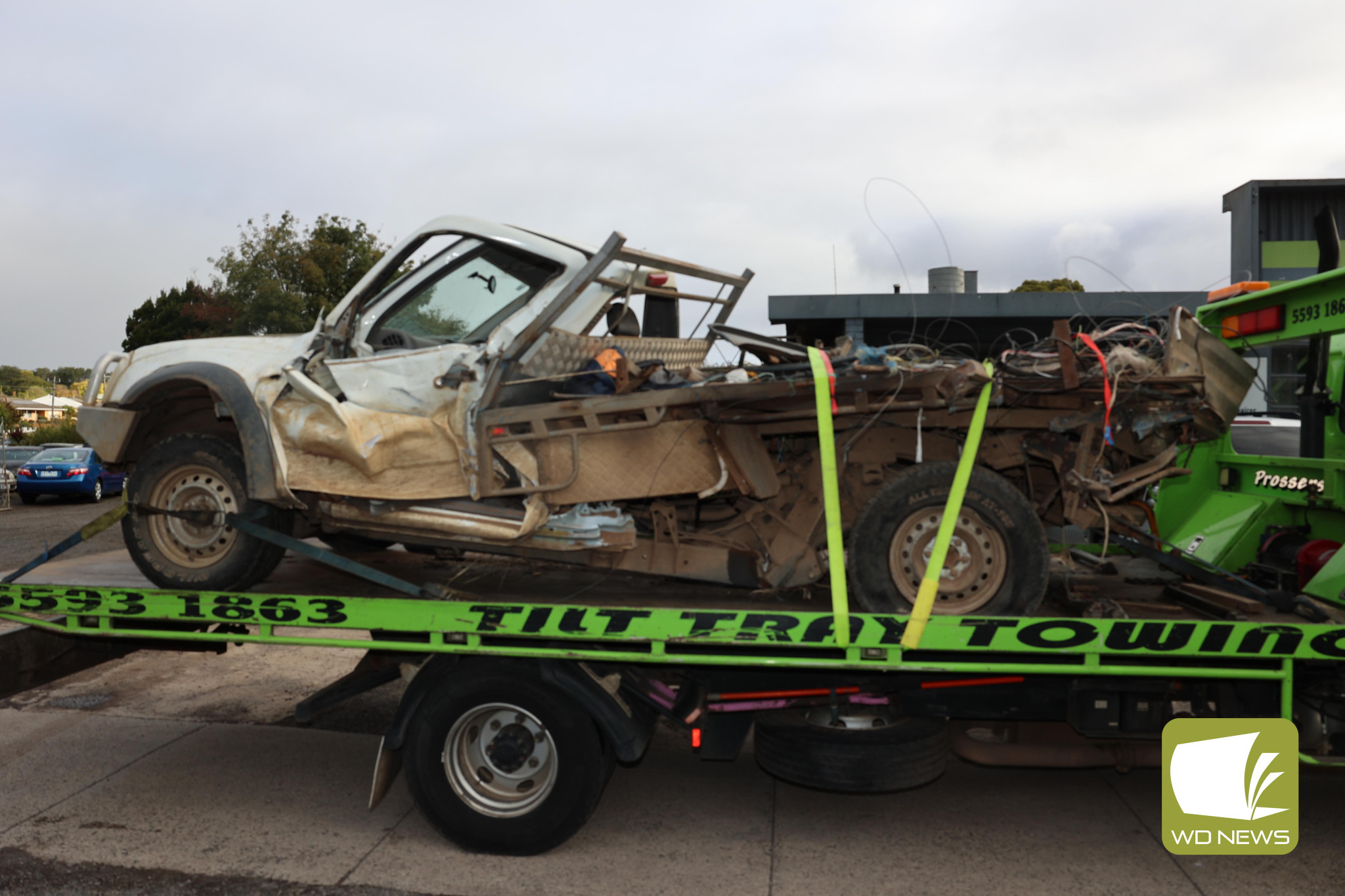 The collision left the ute a mangled wreck.